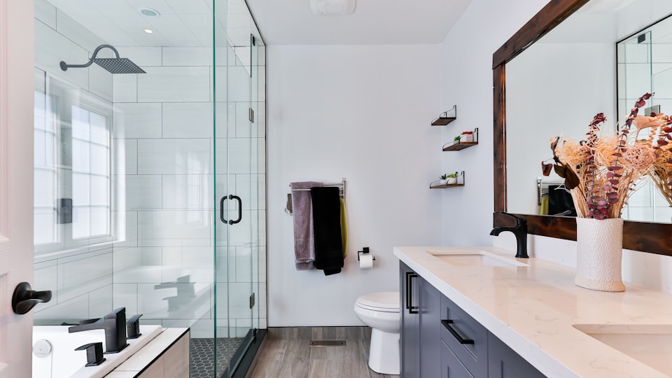 Contemporary bathroom with walk-in shower and wall-hung toilet